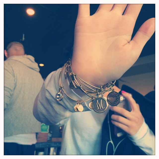 Her hand in protest / loving father is dismissed / like paparazzi. // haikumages