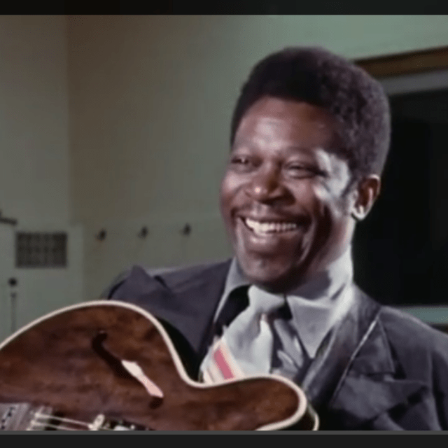 B. B. King smiling - on the set of BBC video (screenshot)