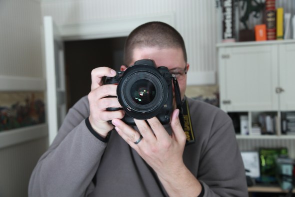 One photographer / shoots another, lens to lens / looping portraiture. // haikumages