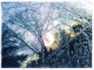 Sunrise viewed / through the ice crystals / on my car. // haikumages - haiku - micropoetry