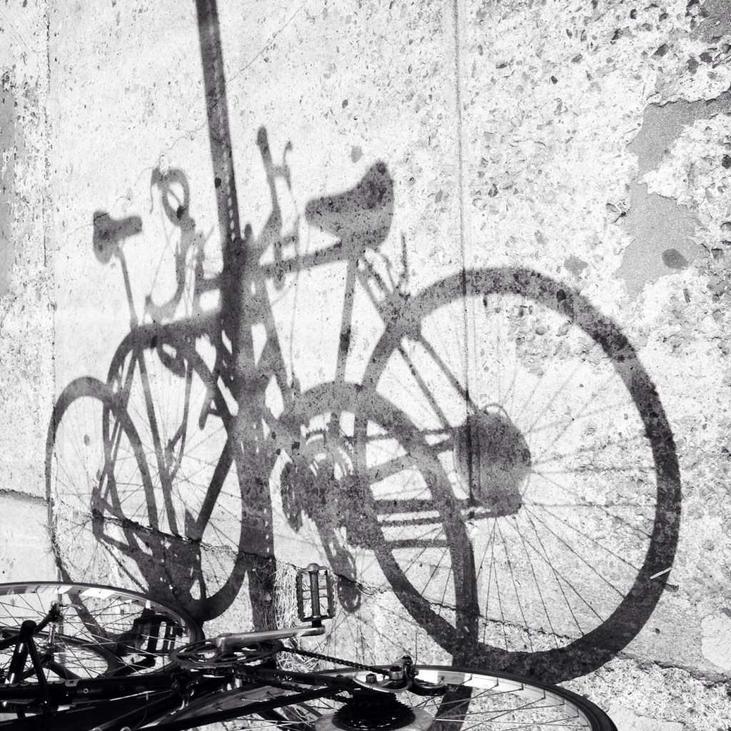Bicycles / two of them may cast / one shadow. // haiku - micropoetry - haikumages
